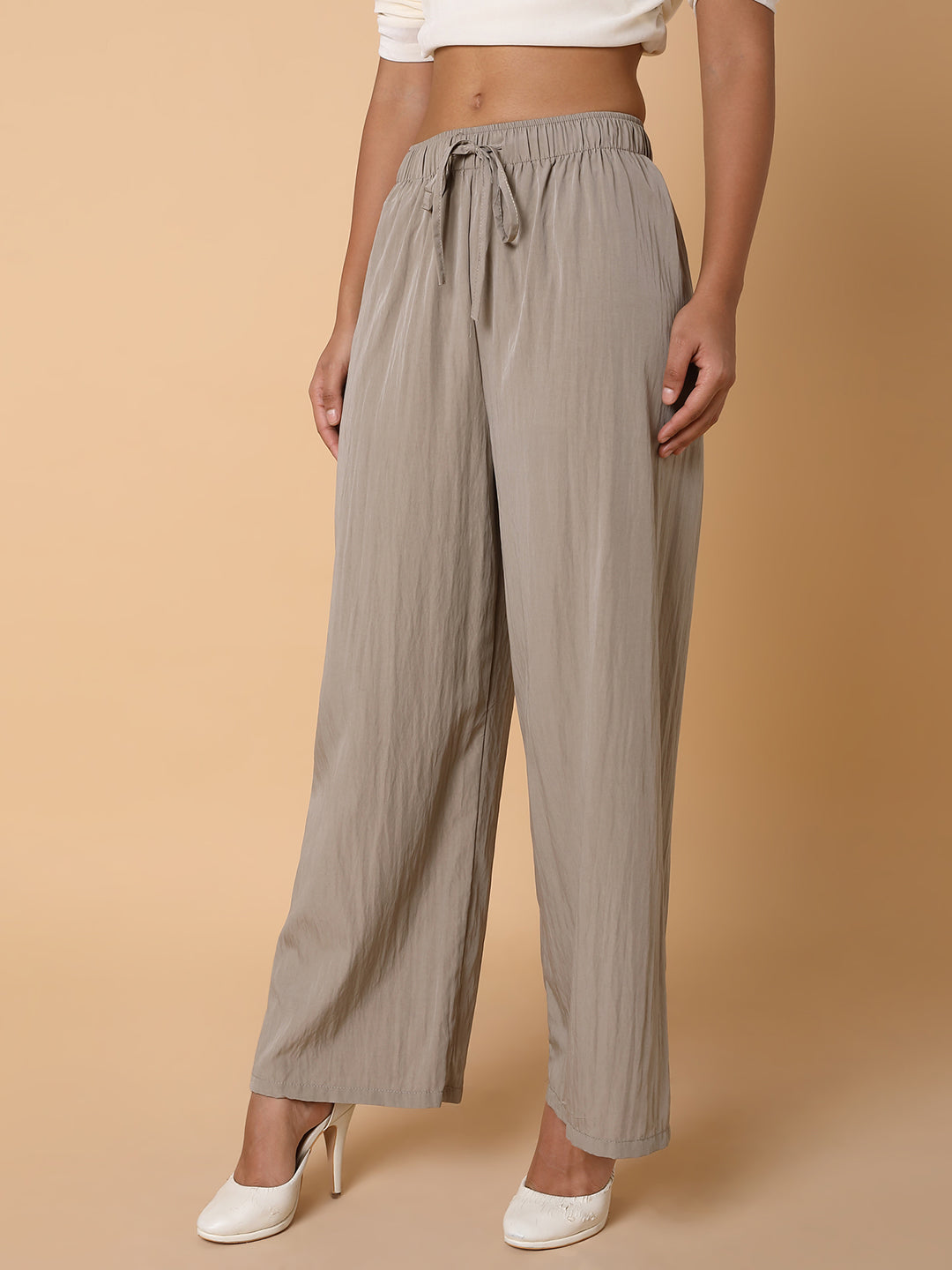 Women Solid Beige Straight Trouser