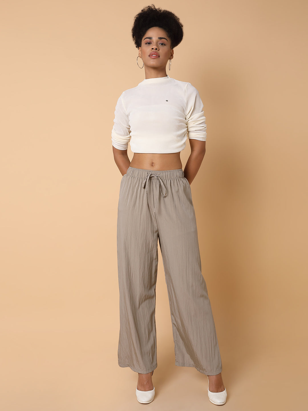 Women Solid Beige Straight Trouser