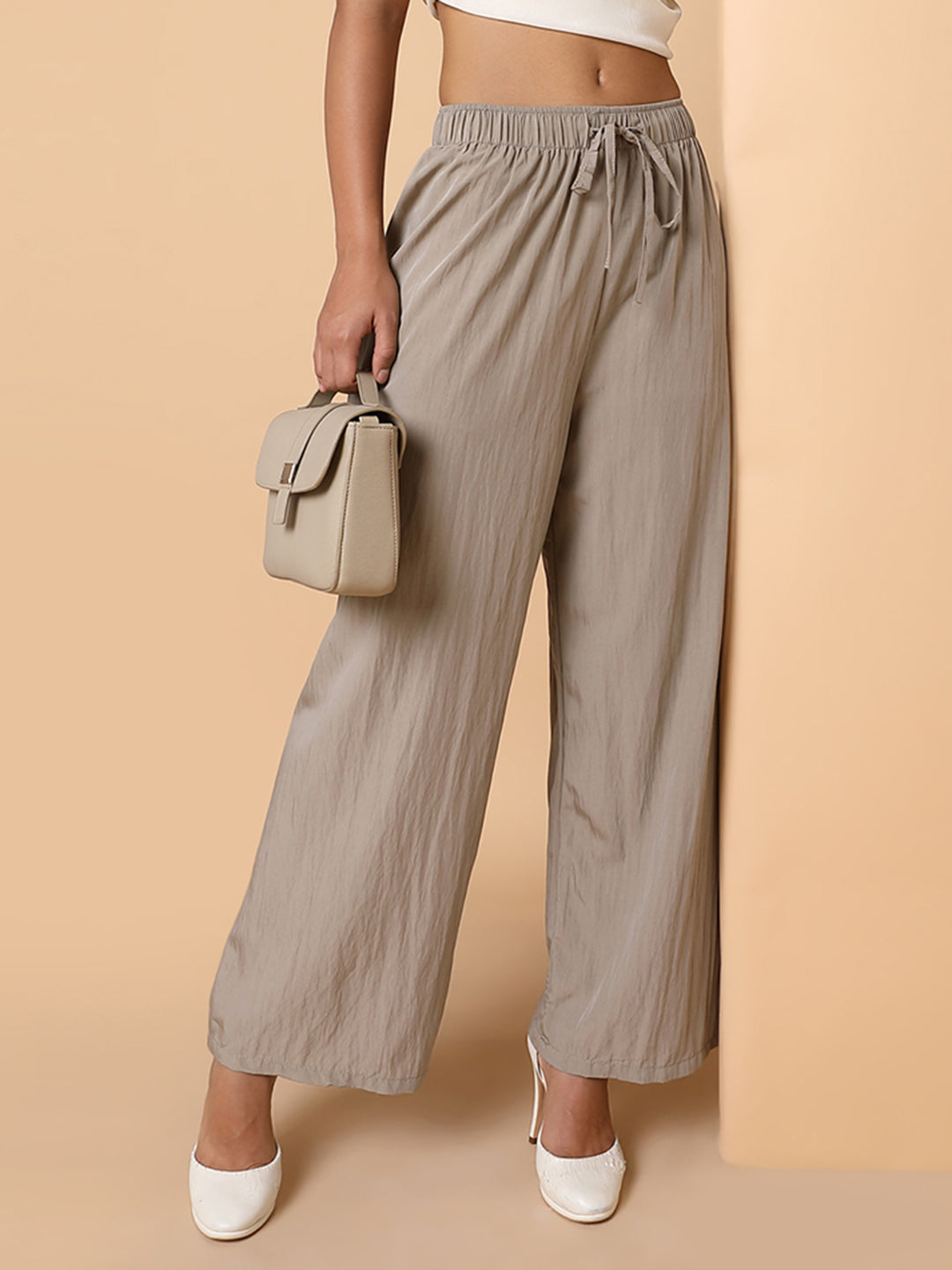 Women Solid Beige Straight Trouser