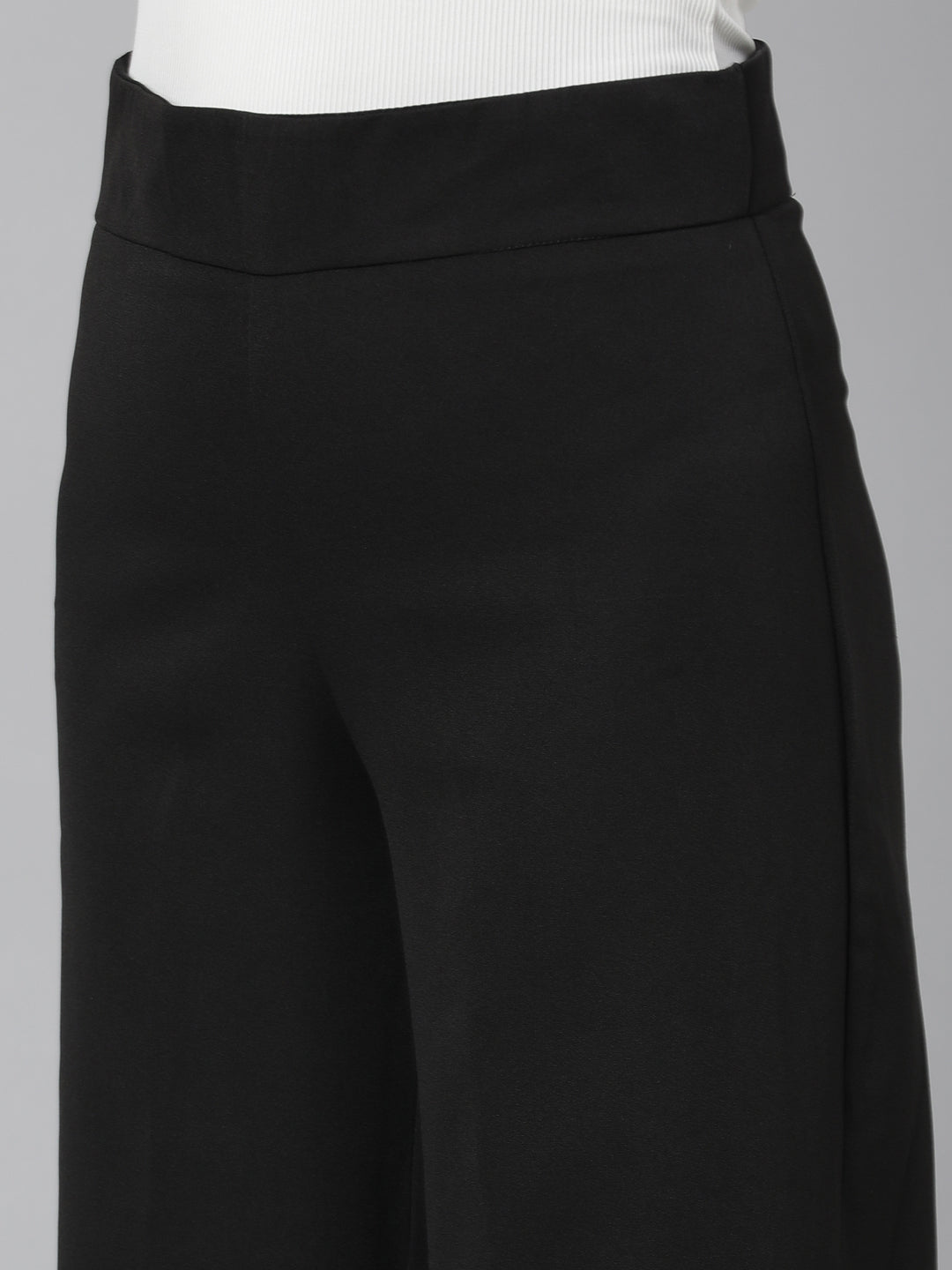 Women Black Solid Parallel Trousers