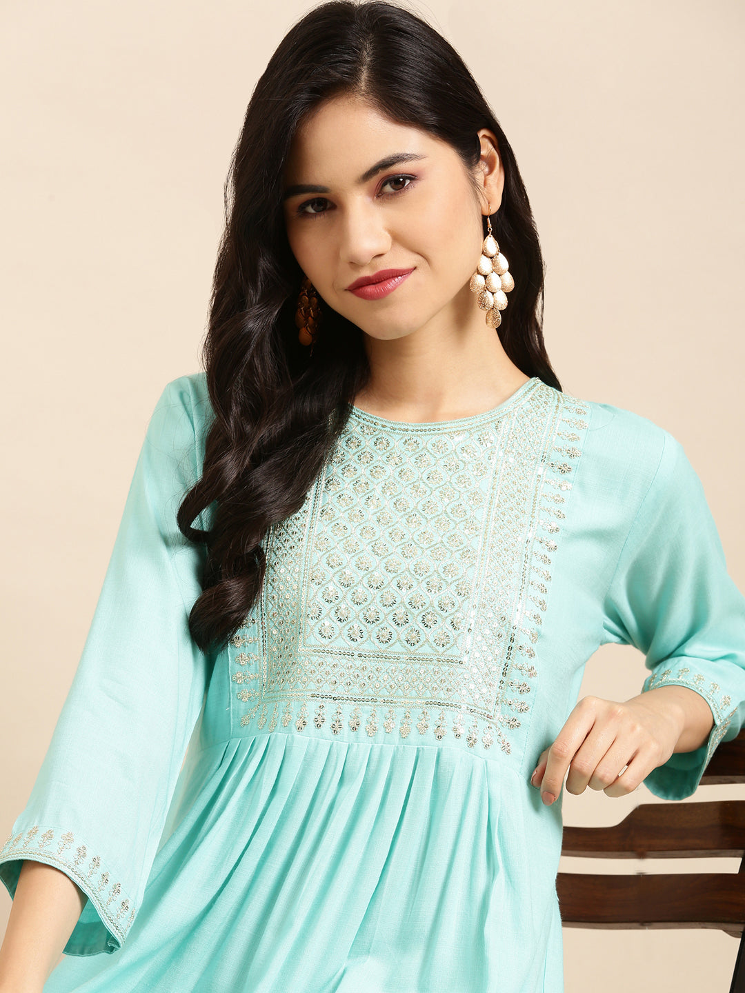 Women Solid Blue Straight Kurti