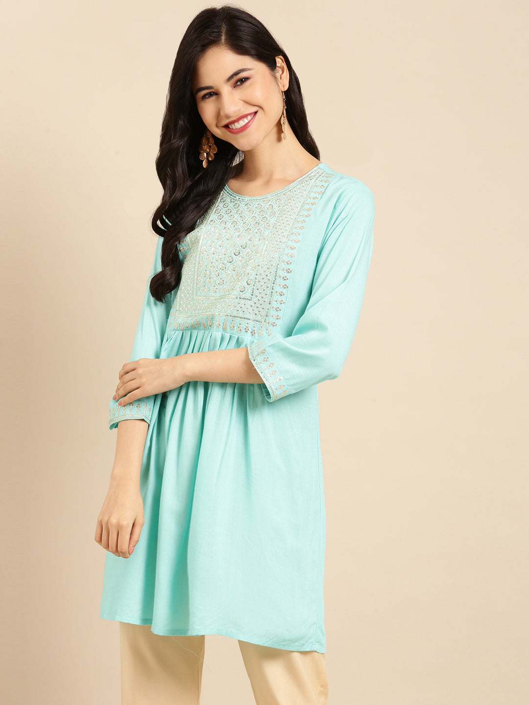 Women Solid Blue Straight Kurti