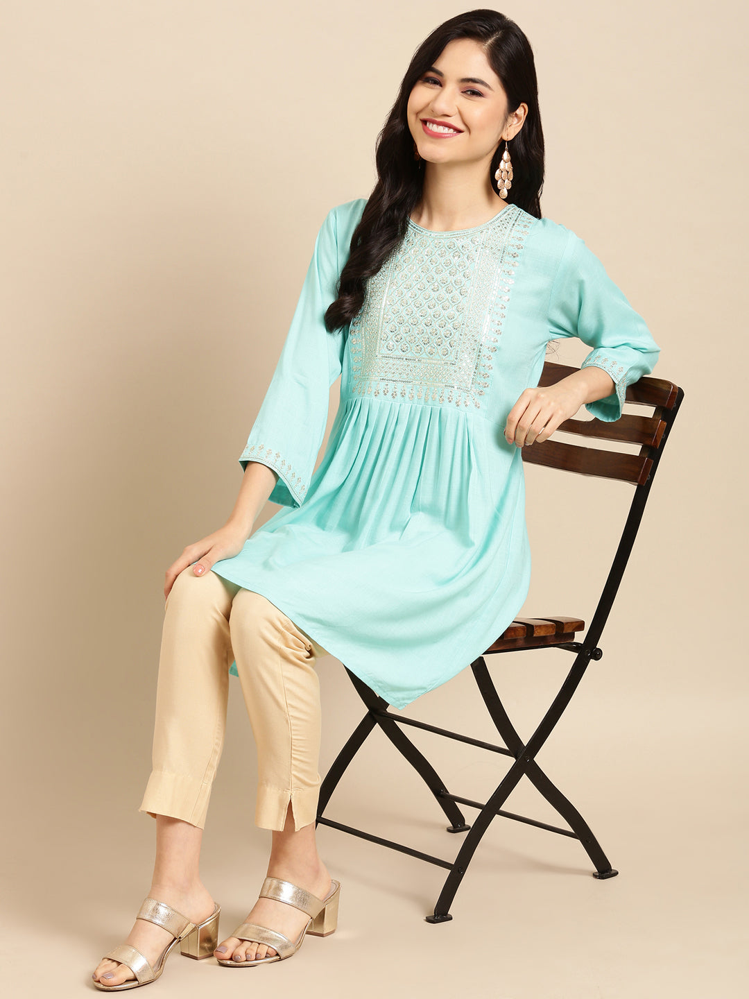 Women Solid Blue Straight Kurti