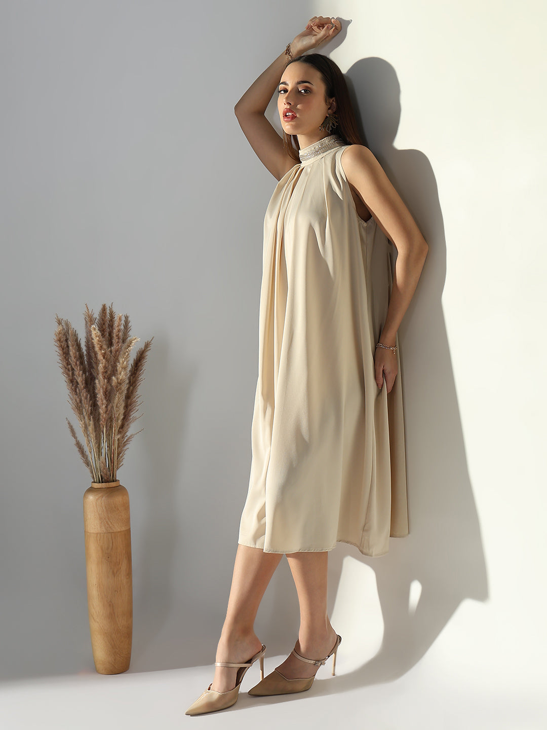 Women Beige Solid A Line Dress