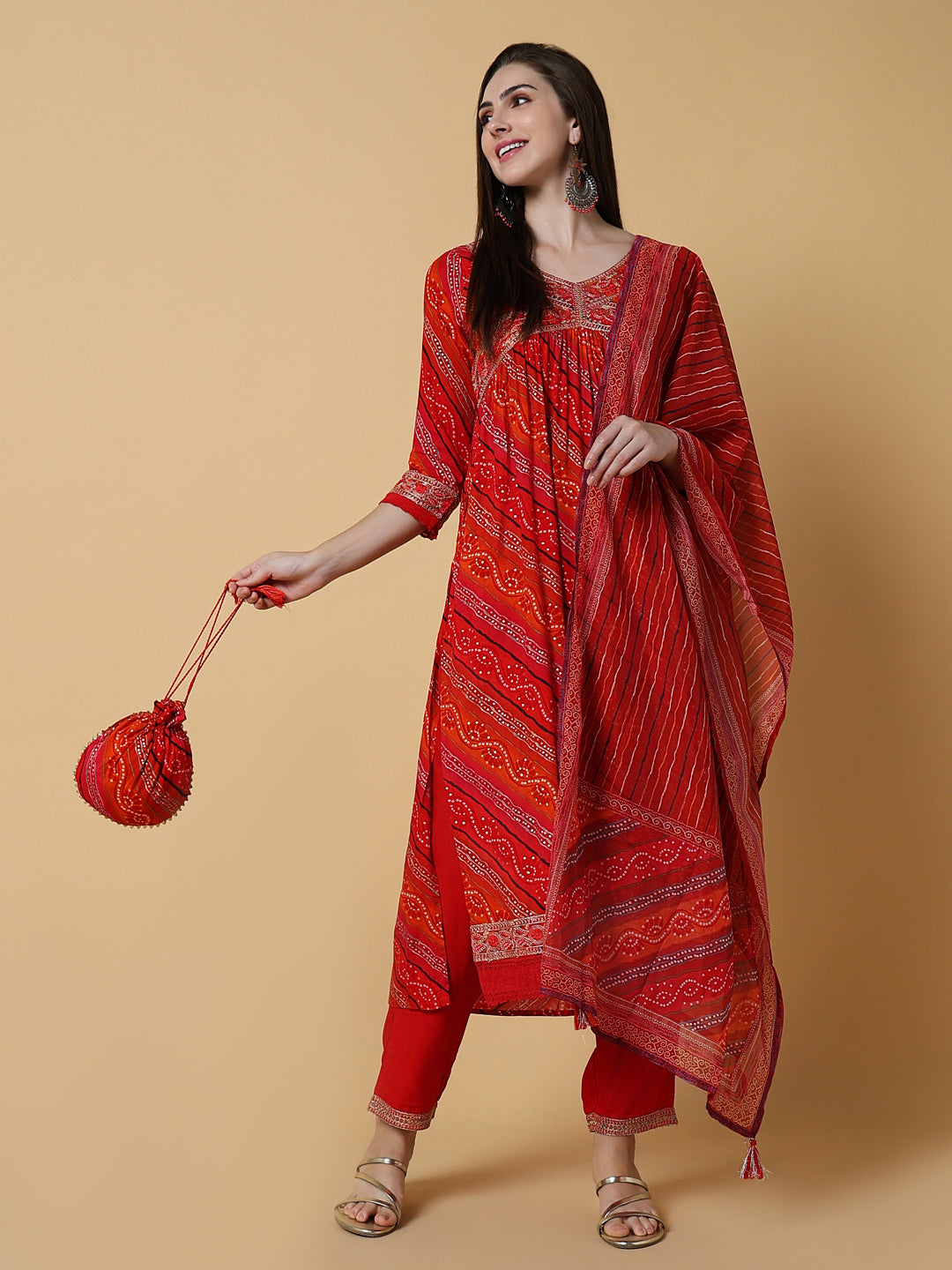 Women Graphic Orange A-Line Kurta Set with Dupatta and Potli Bag