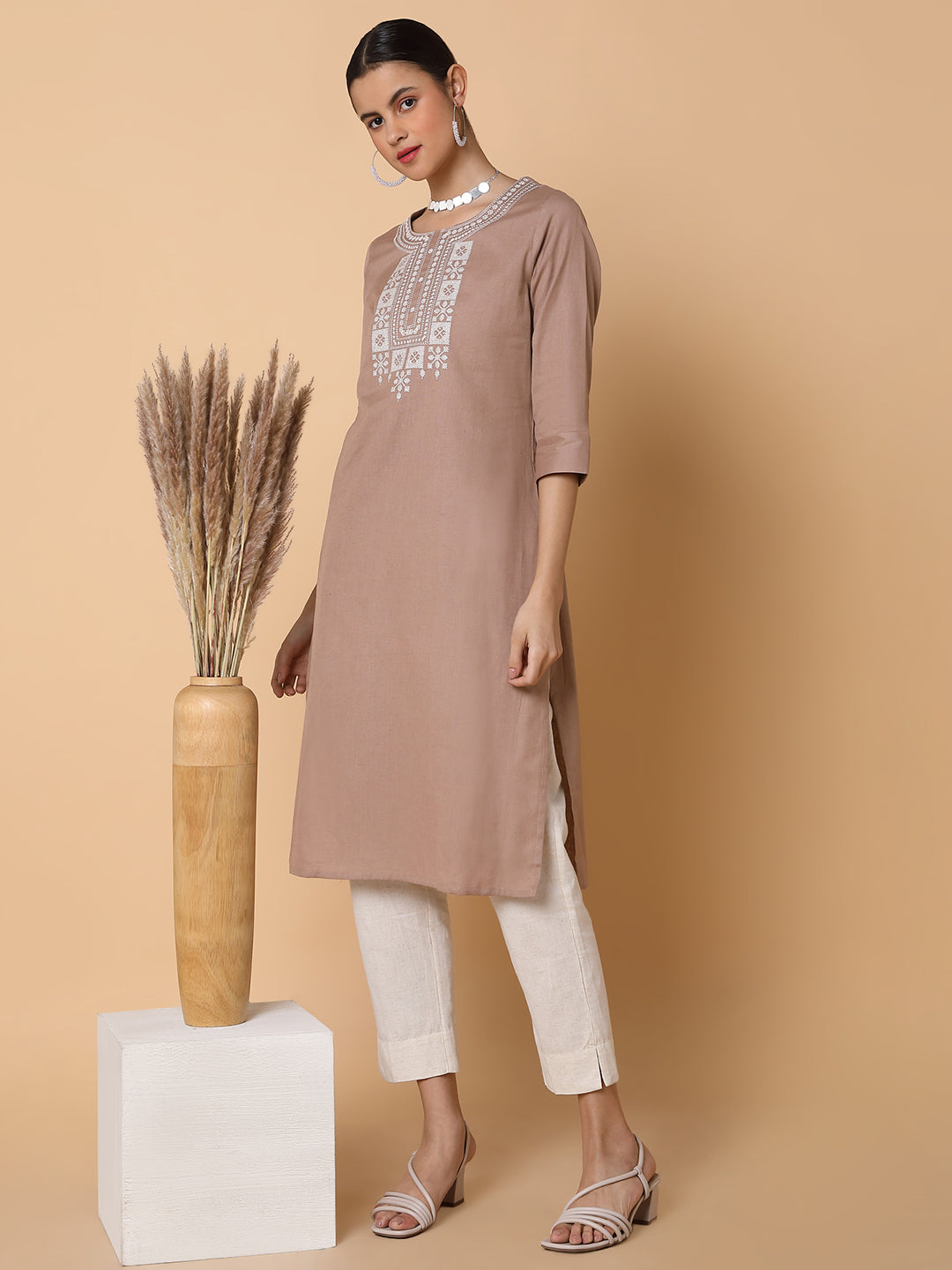 Women Solid Beige Straight Kurta