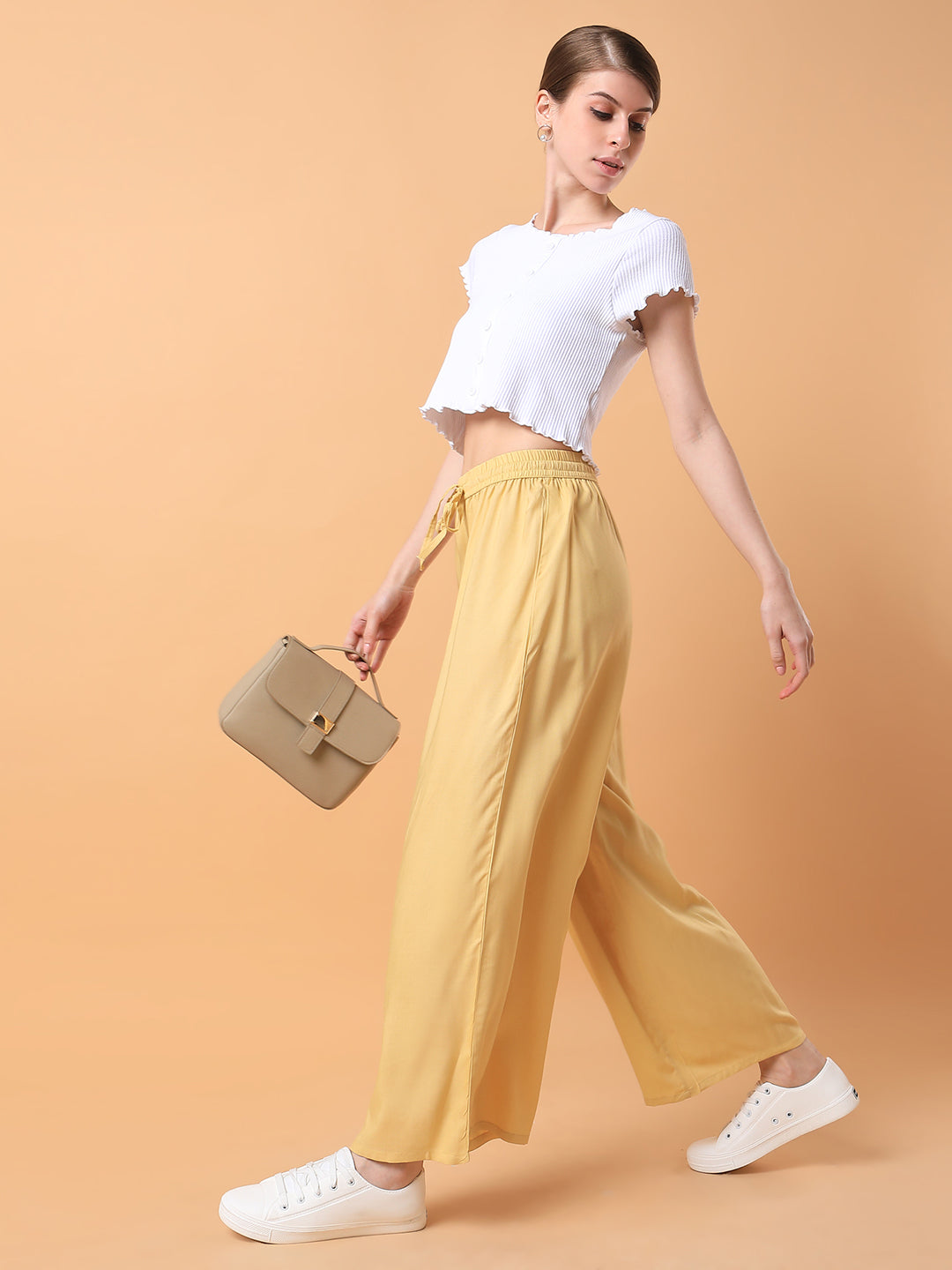 Women Yellow Solid Pleated Loose Fit Trouser