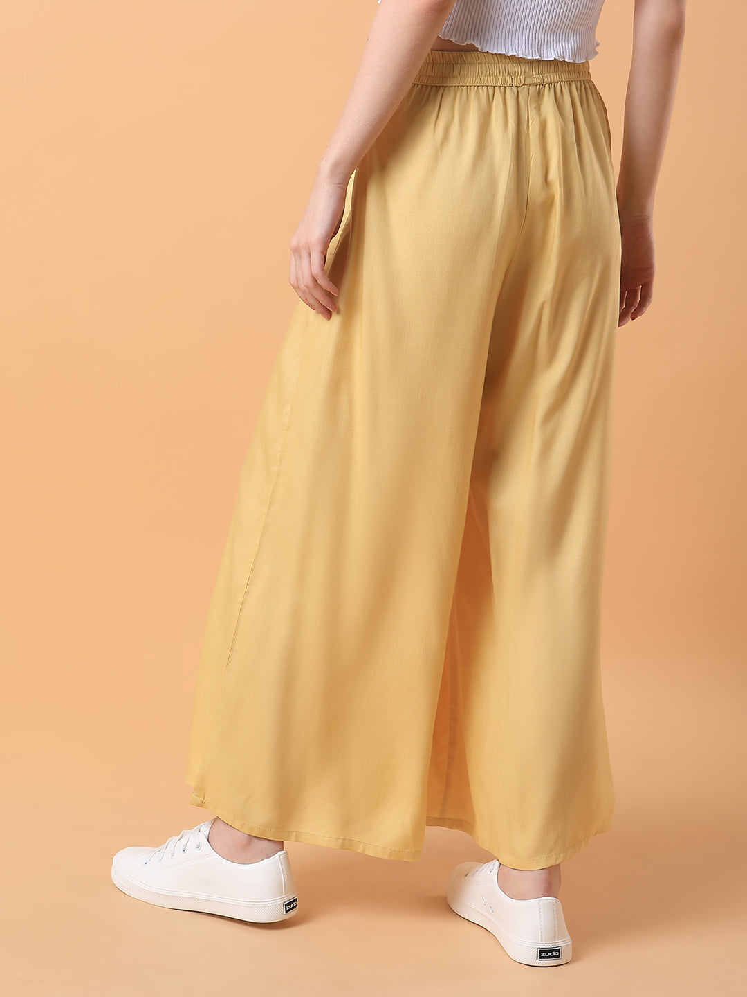 Women Yellow Solid Pleated Loose Fit Trouser