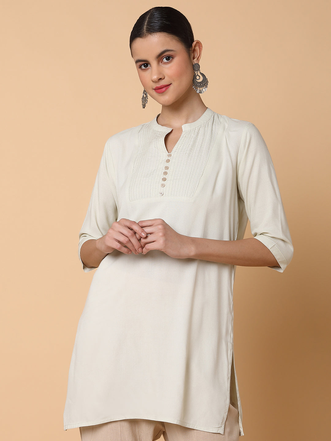 Women Solid Beige Straight Kurti