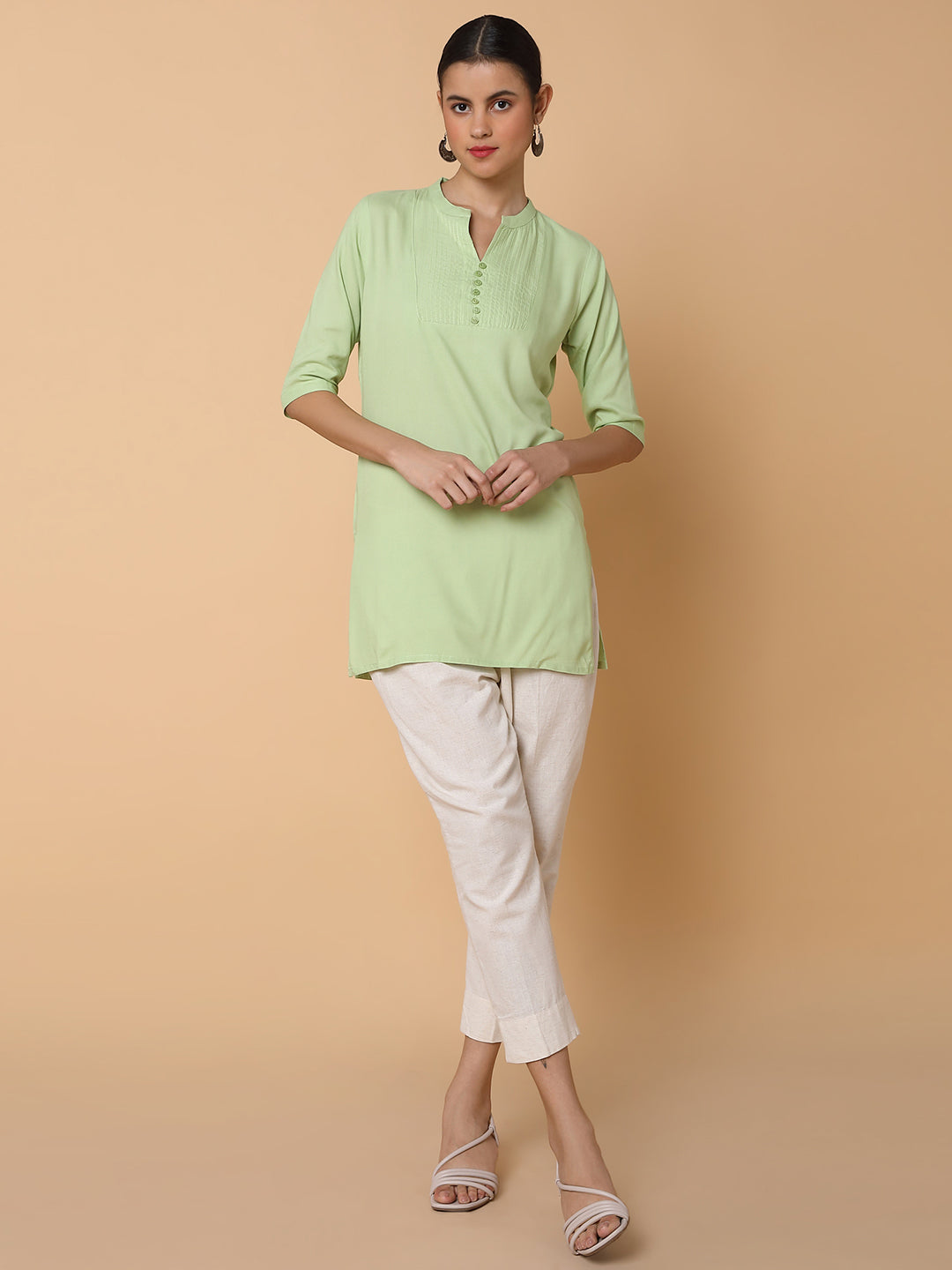 Women Solid Sea Green Straight Kurti