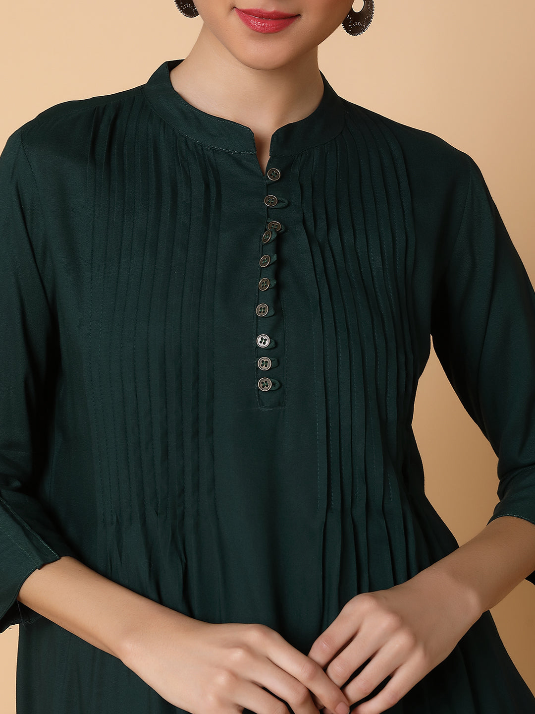 Women Solid Green Straight Kurti