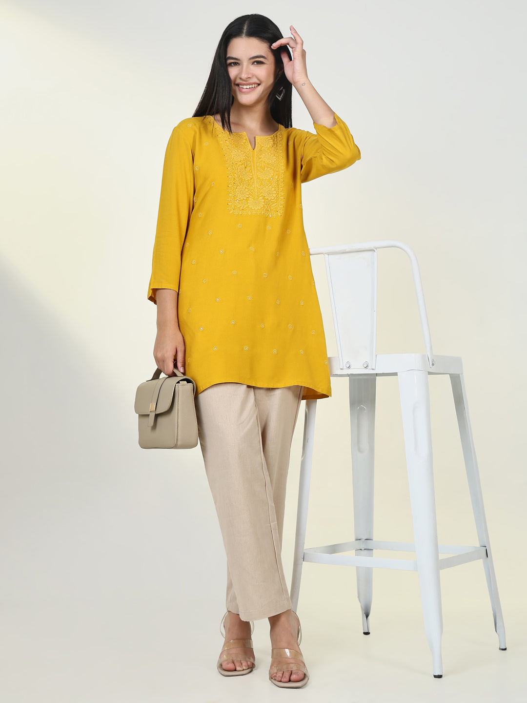 Women Yellow Solid Straight Kurti