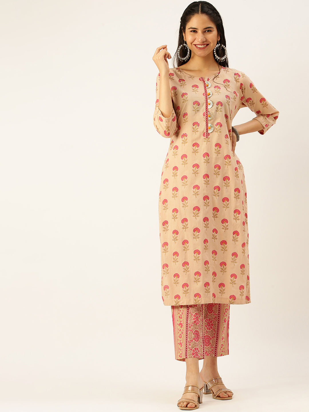 Women's Peach Printed Kurta Sets