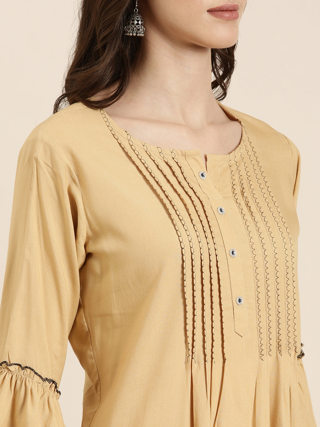 Women Beige Solid A-Line Kurti