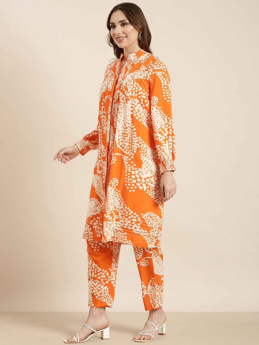Women A-Line Orange Abstract Kurta and Trousers Set