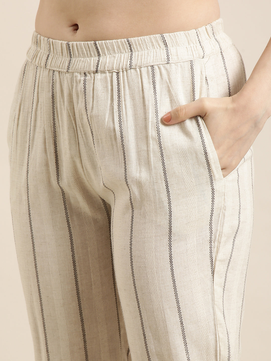 Women A-Line Cream Woven Design Kurta and Trousers Set