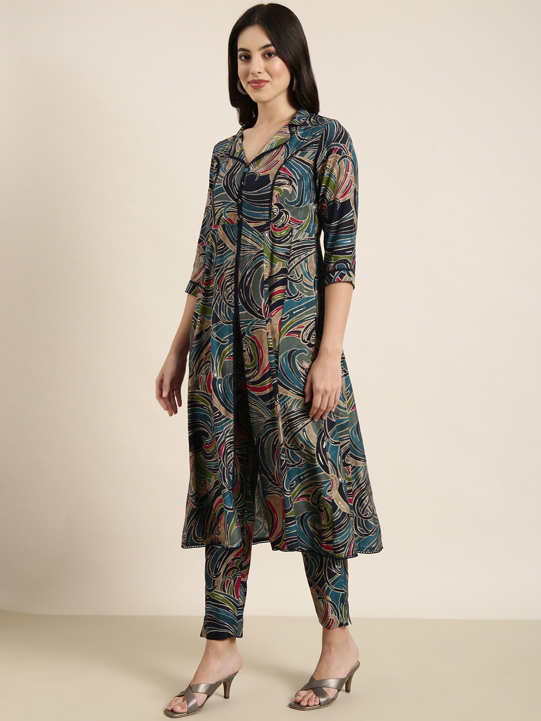 Women A-Line Teal Abstract Kurta and Trousers Set