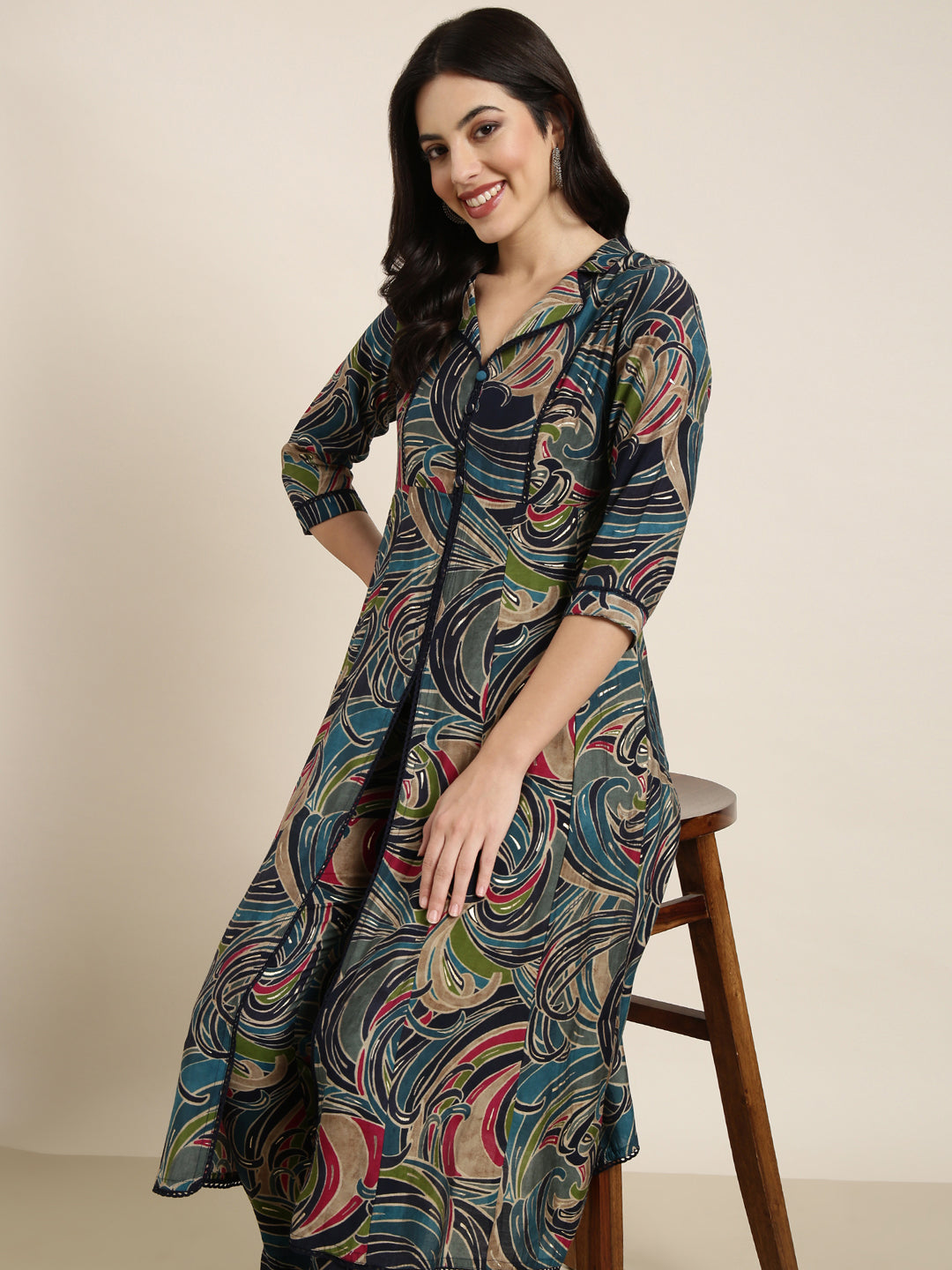 Women A-Line Teal Abstract Kurta and Trousers Set